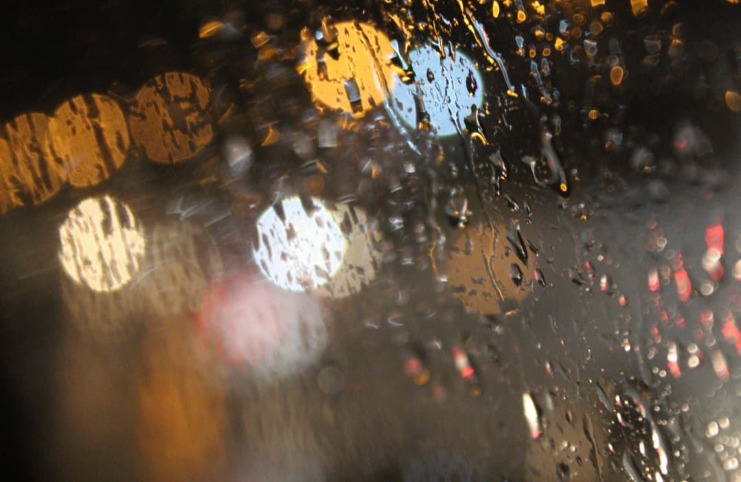 A rainy ride back home.. street photograph by Maahir Garg.