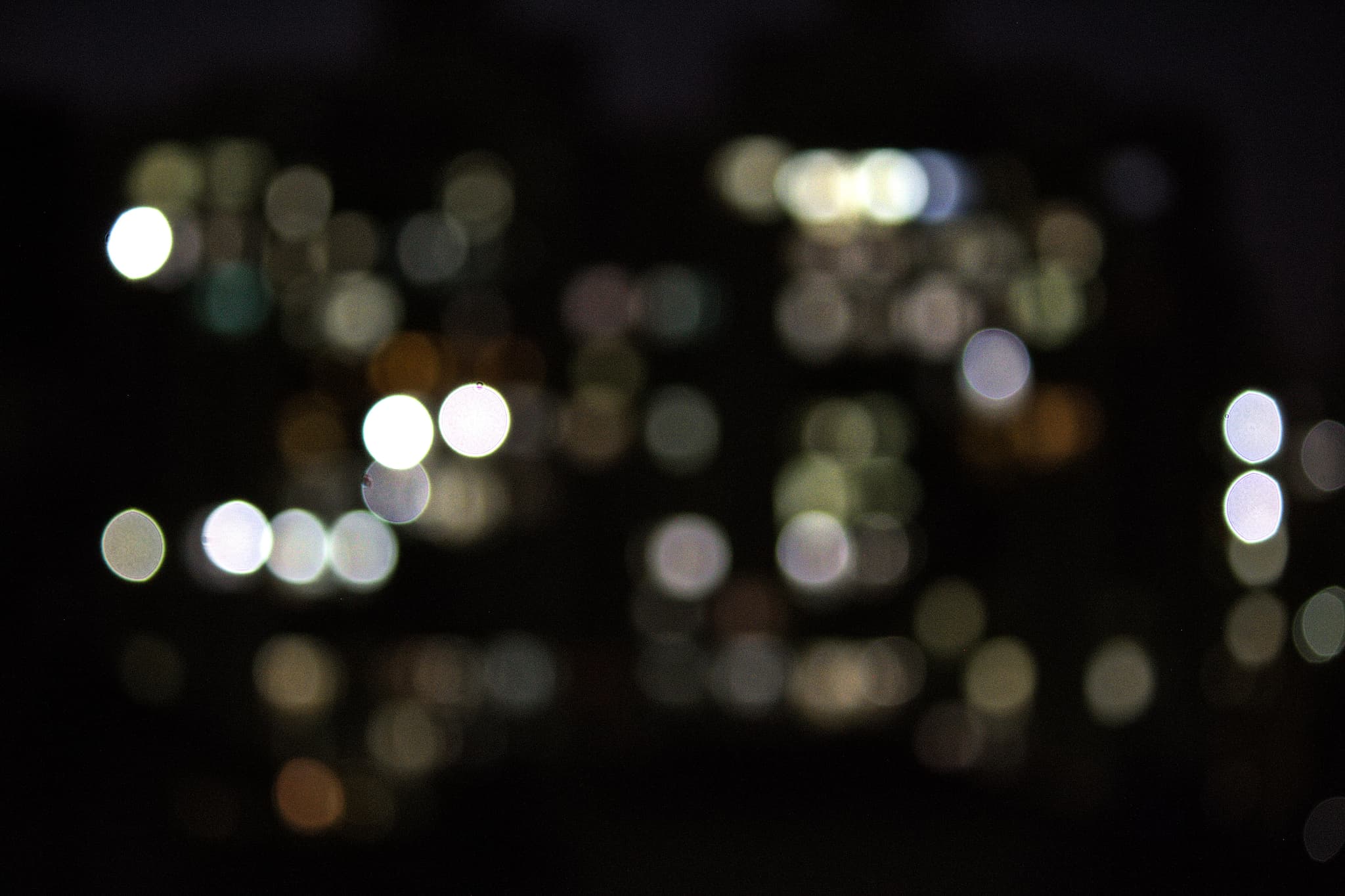 Lost in the city glow.. street photograph by Maahir Garg.